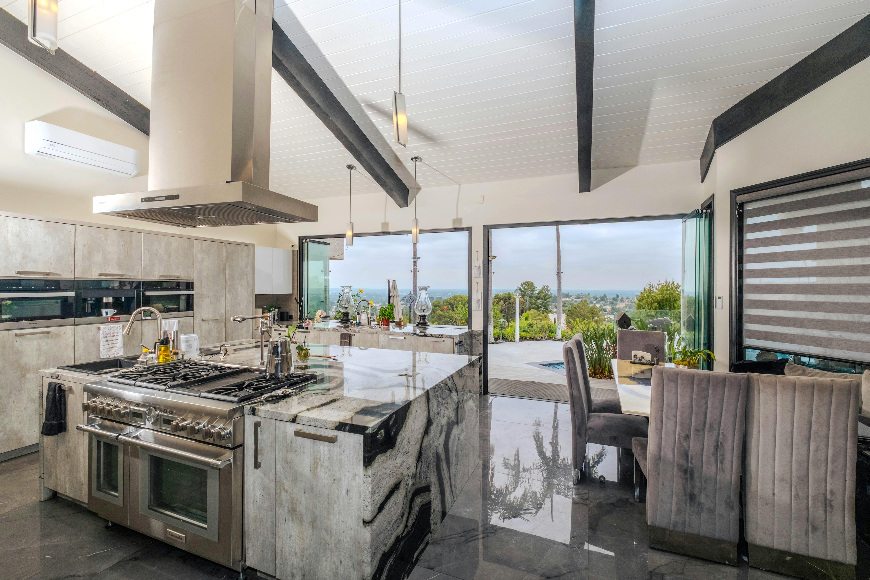 Skyline Ridge Villa — Modern Hilltop Estate with Sunset Pool Deck, Panoramic Views & Full-Service Event Hosting