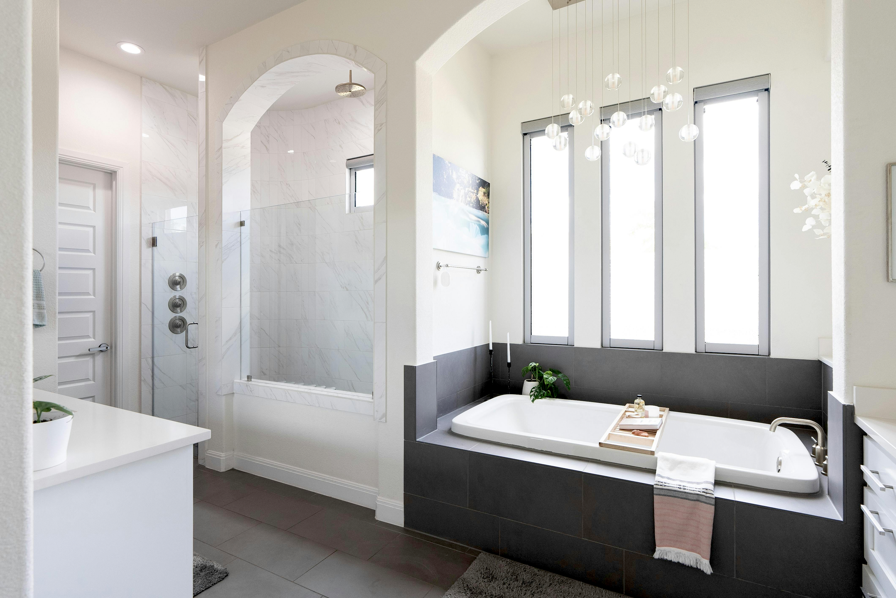 Modern, bright home with white walls and high ceilings. 