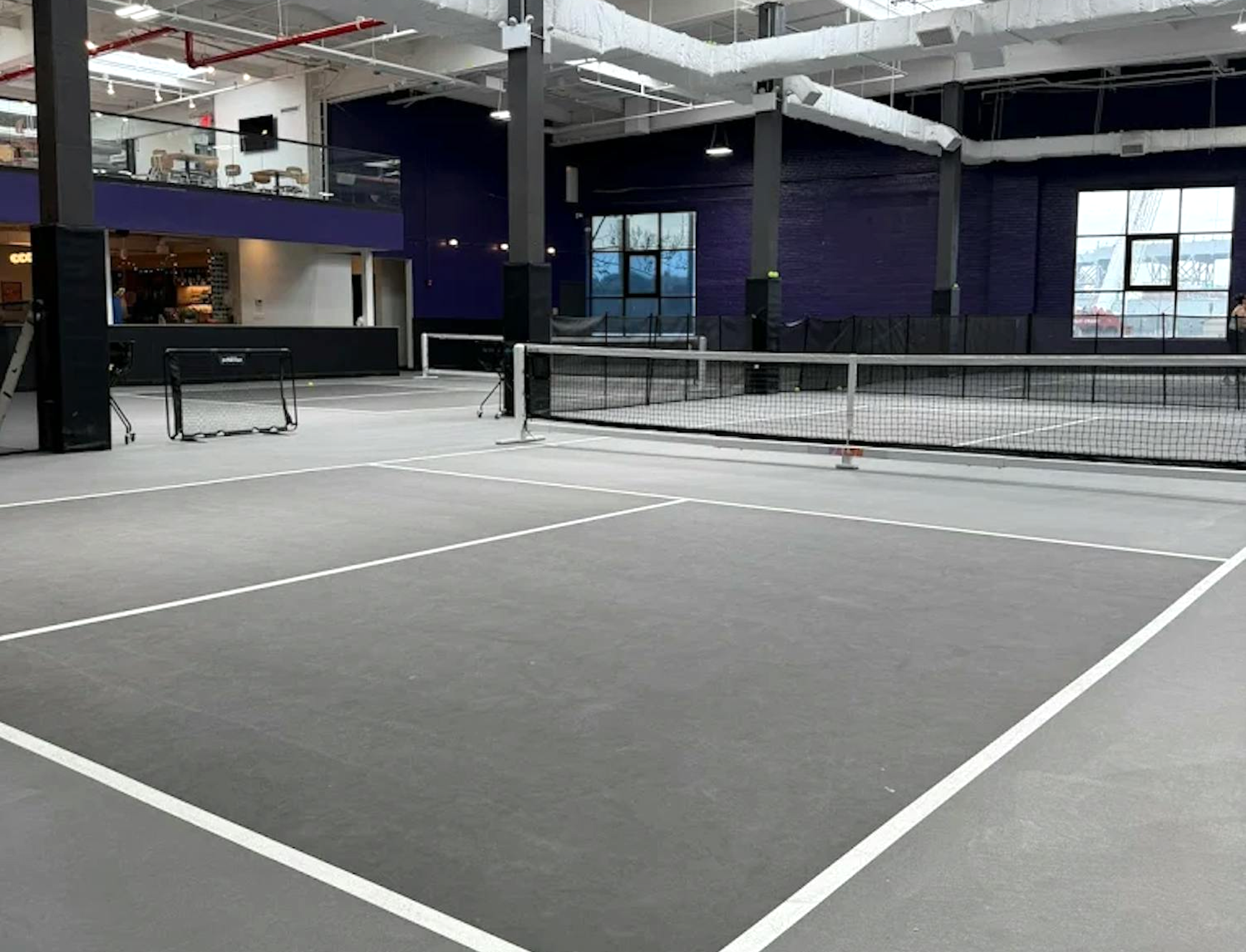 Iconic Pickleball Club w/ Open Floor, Skylights, and Bar