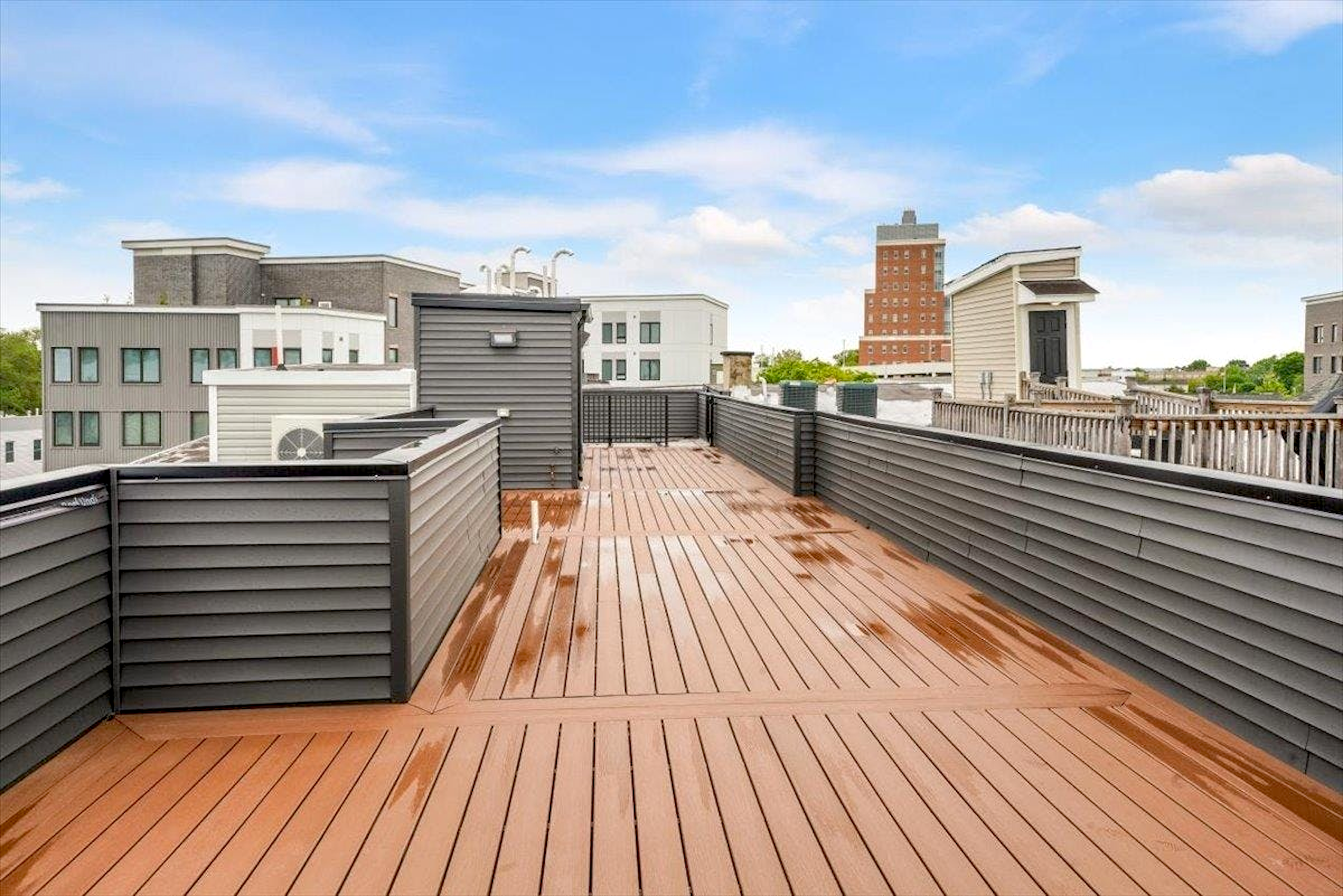 Sunlit Top-Floor Condo with Private Rooftop & NYC Skyline Views