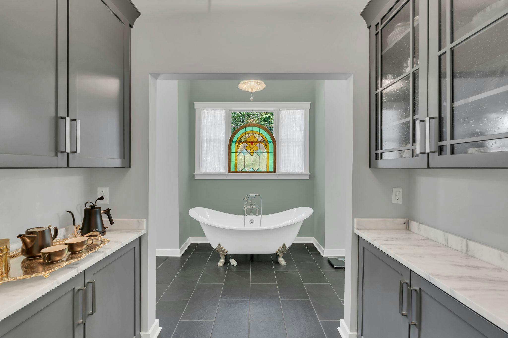 Wooded acreage with outbuildings and open plan home