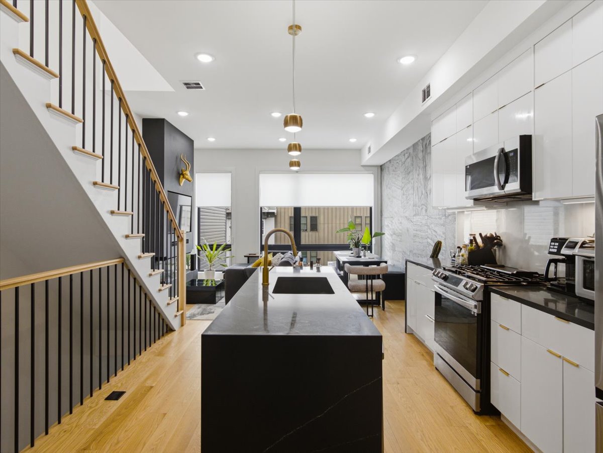 Sunlit Top-Floor Condo with Private Rooftop & NYC Skyline Views