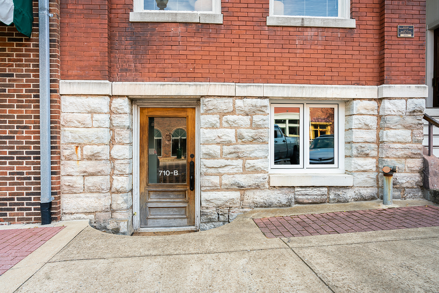 Moody warm space with exposed brick