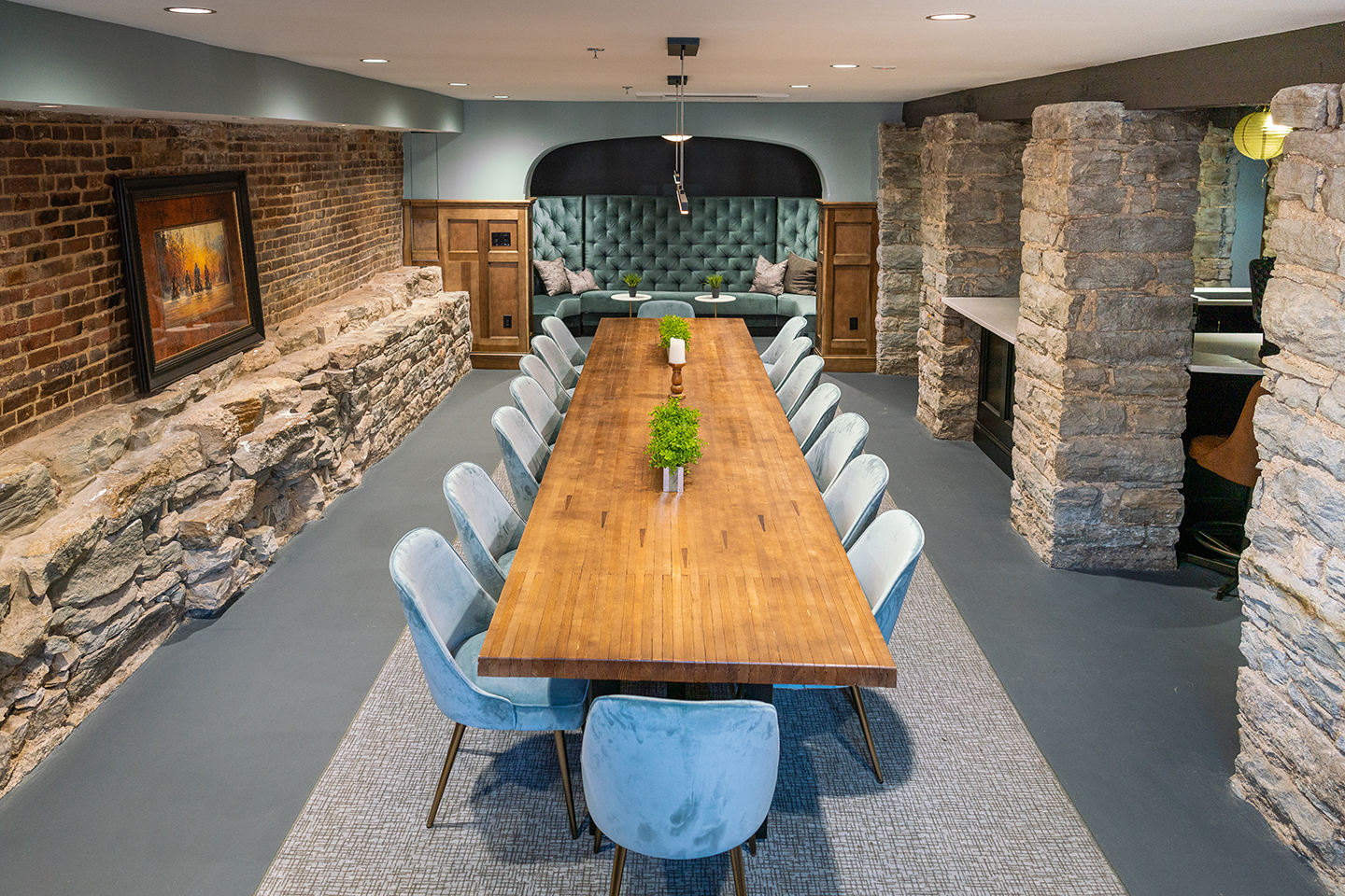 Moody warm space with exposed brick