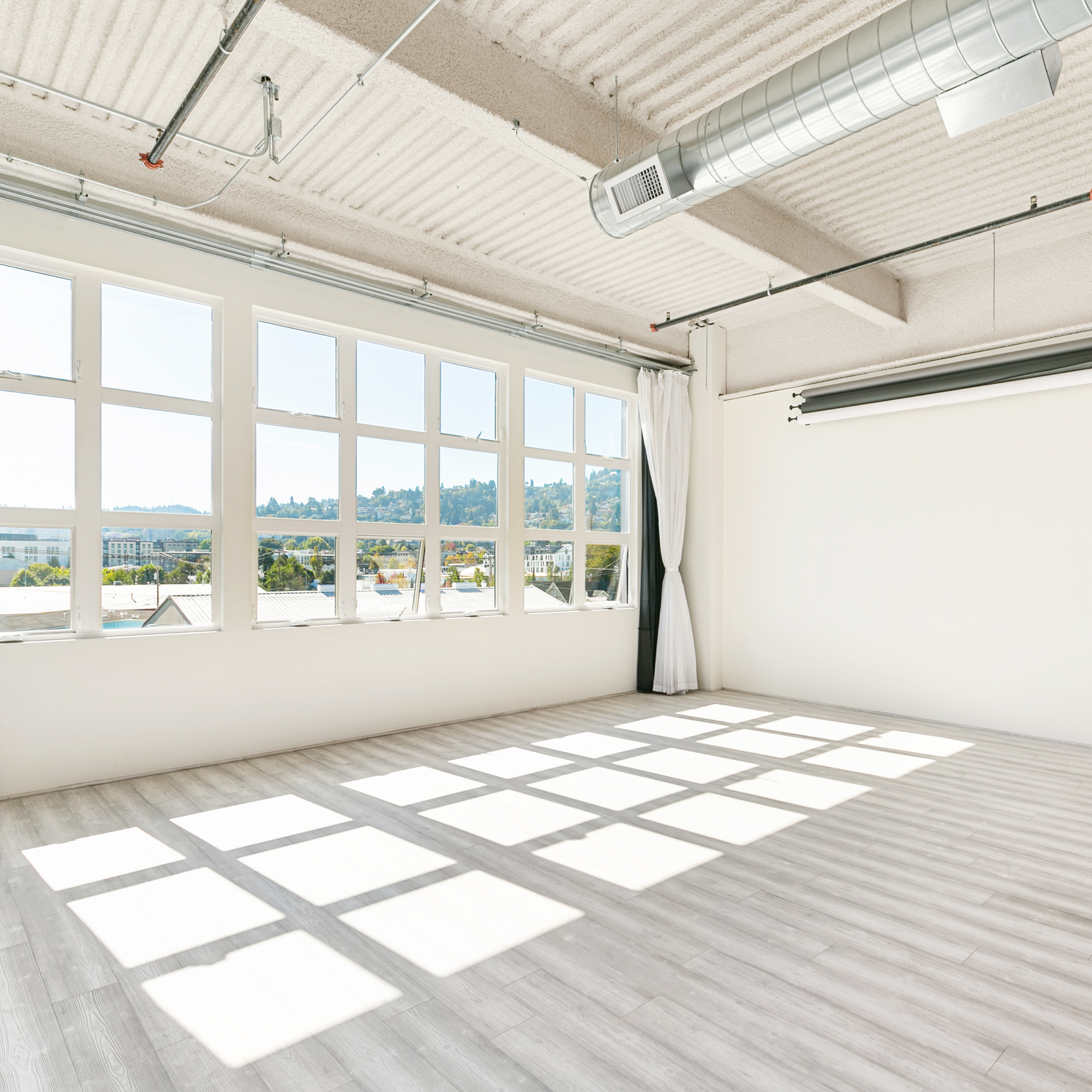 The Apex Studio. Photographers, Videographers, Daylight studio with huge corner windows with a view!