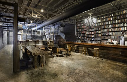 Speakeasy Bar and Lounge with Bookshelf Wall