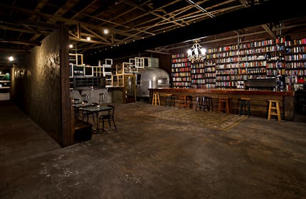 Speakeasy Bar and Lounge with Bookshelf Wall
