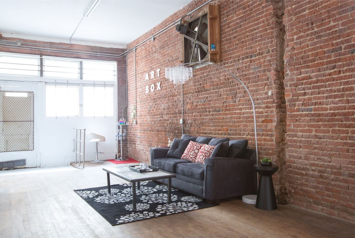 HUGE PHOTO/VIDEO/FILM  STUDIO- Loft with exposed brick, columns and 12 ft ceilings.