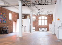 HUGE PHOTO/VIDEO/FILM  STUDIO- Loft with exposed brick, columns and 12 ft ceilings.
