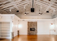 The Caldwell - Bright open space with original hardwood, original stone work and vaulted ceilings