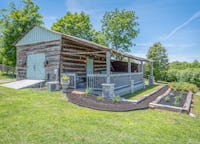 Log Cabin on 16 Acres with Views, a Porch, Rocking Chairs, the Works