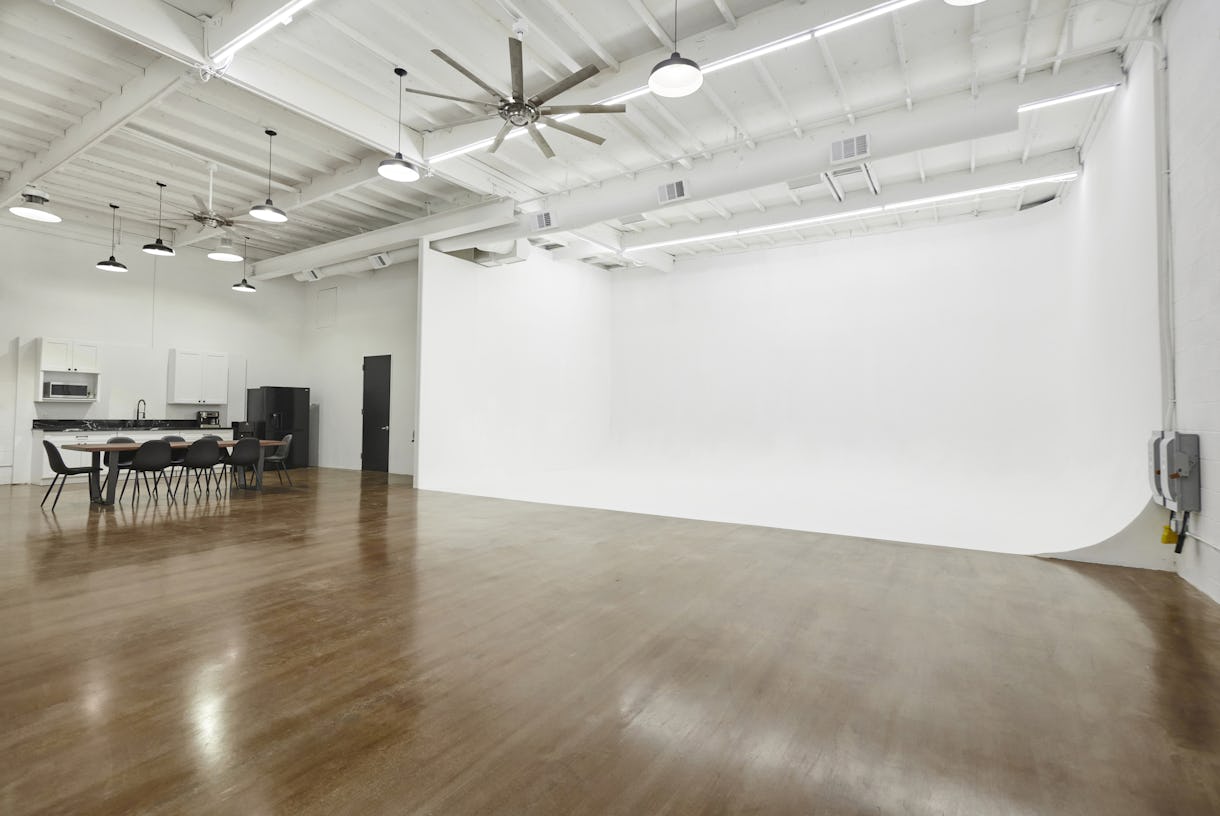 Arts District completely private photo studio with L-shaped cyclorama, in house equipment, large private parking lot for basecamp or outdoor shoots
