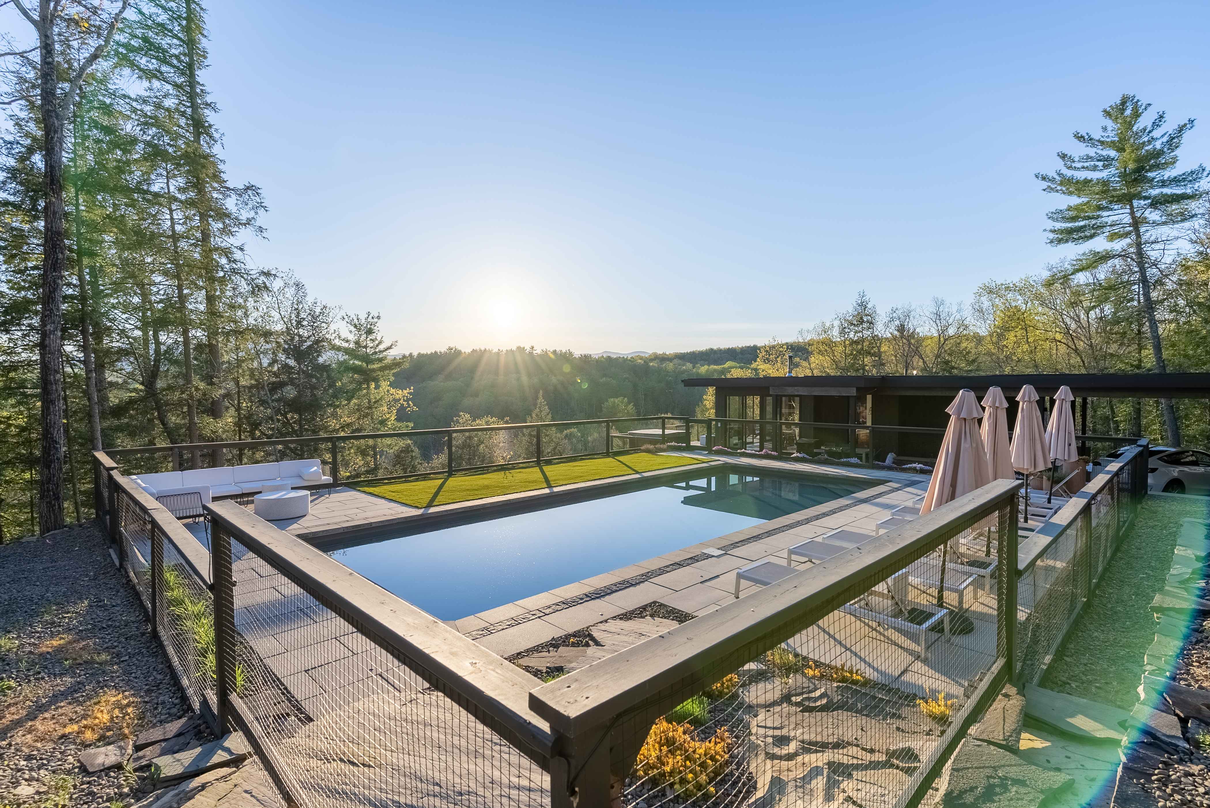 Modern Paradise with Pool across 8 Secluded Acres in NY