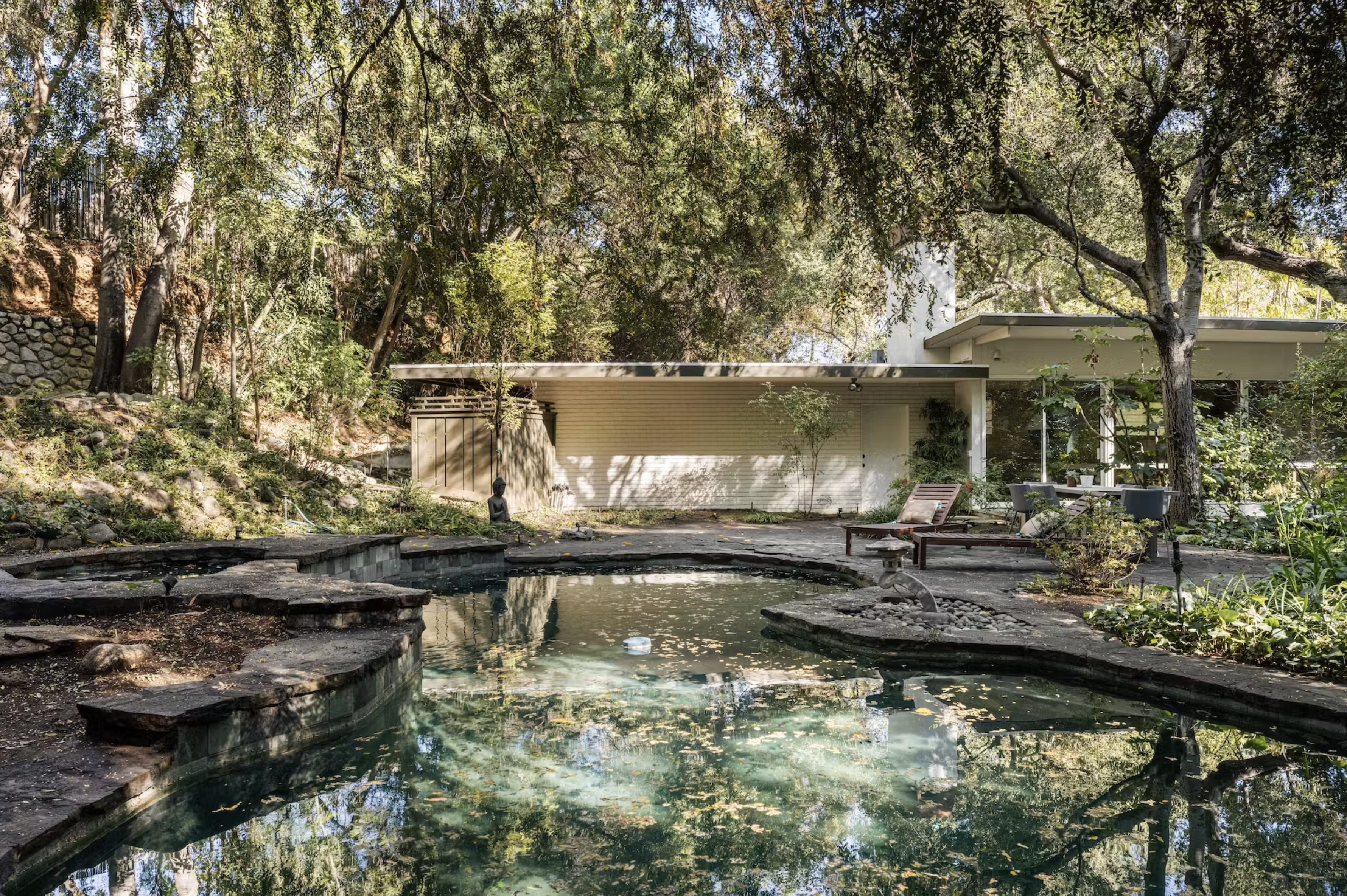 Historic Midcentury with Live Oaks and Stunning Natural Pool