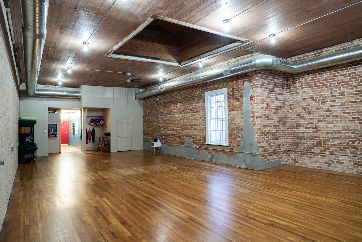 Beautiful Studio with Exposed Brick and Wood Floors
