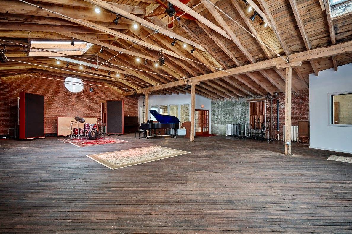 Rustic Studio with Natural Wood and Brick for Film & Photo
