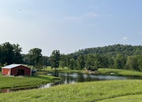 Rural, wild and modern West Virginia 200 acre farm with rare "dark skies." Modern, stylish main house, charming guest house, obligatory trailer, new industrial barn and rustic, antique barn. Private lake surrounded by a river with rapids.