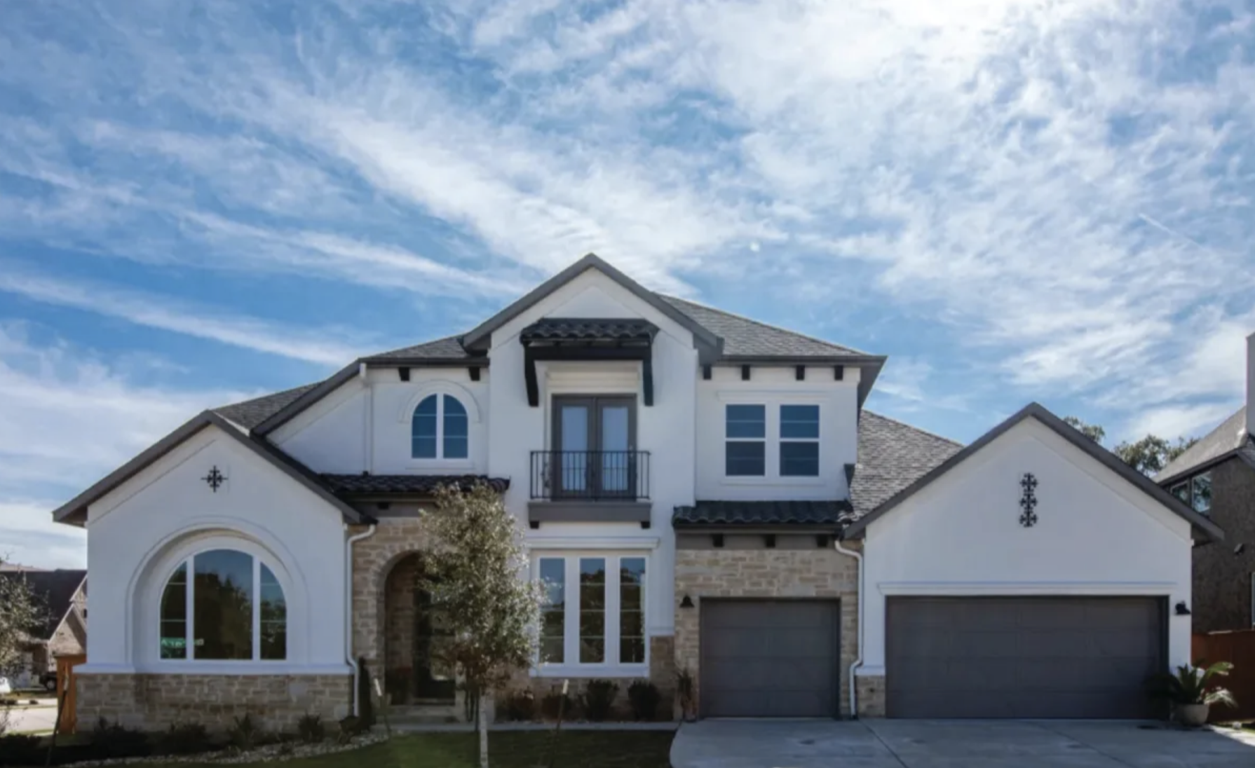 Modern, bright home with white walls and high ceilings. 