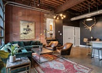 Stunning Glass Garage Door Condo near Downtown Nashville with Exposed Brick and High End Furnishings 