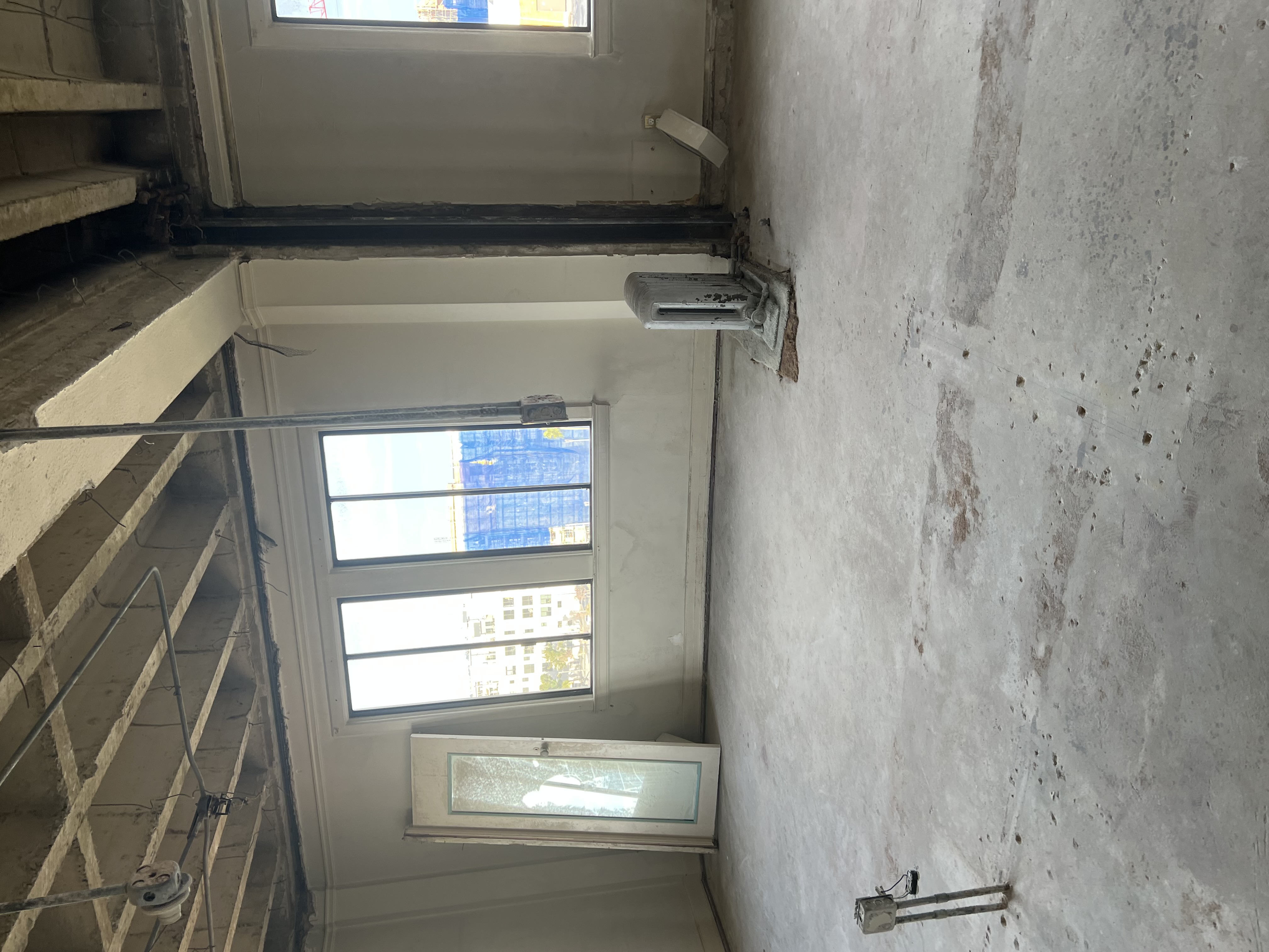 Downtown Bare Under Construction Exposed Small Studio Apartment with Skyline City View