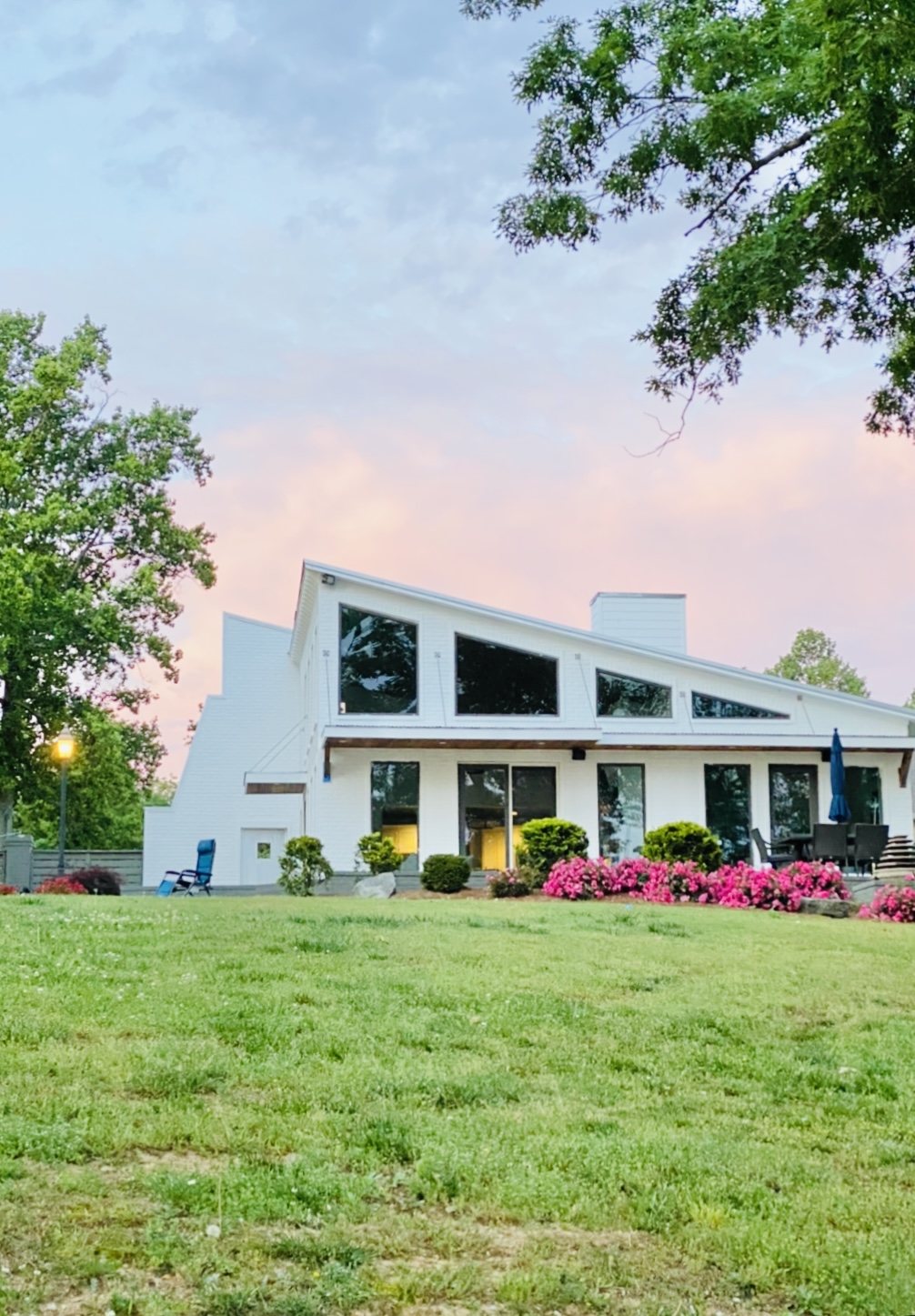 Modern Lake House with Panoramic Views of Open Water 