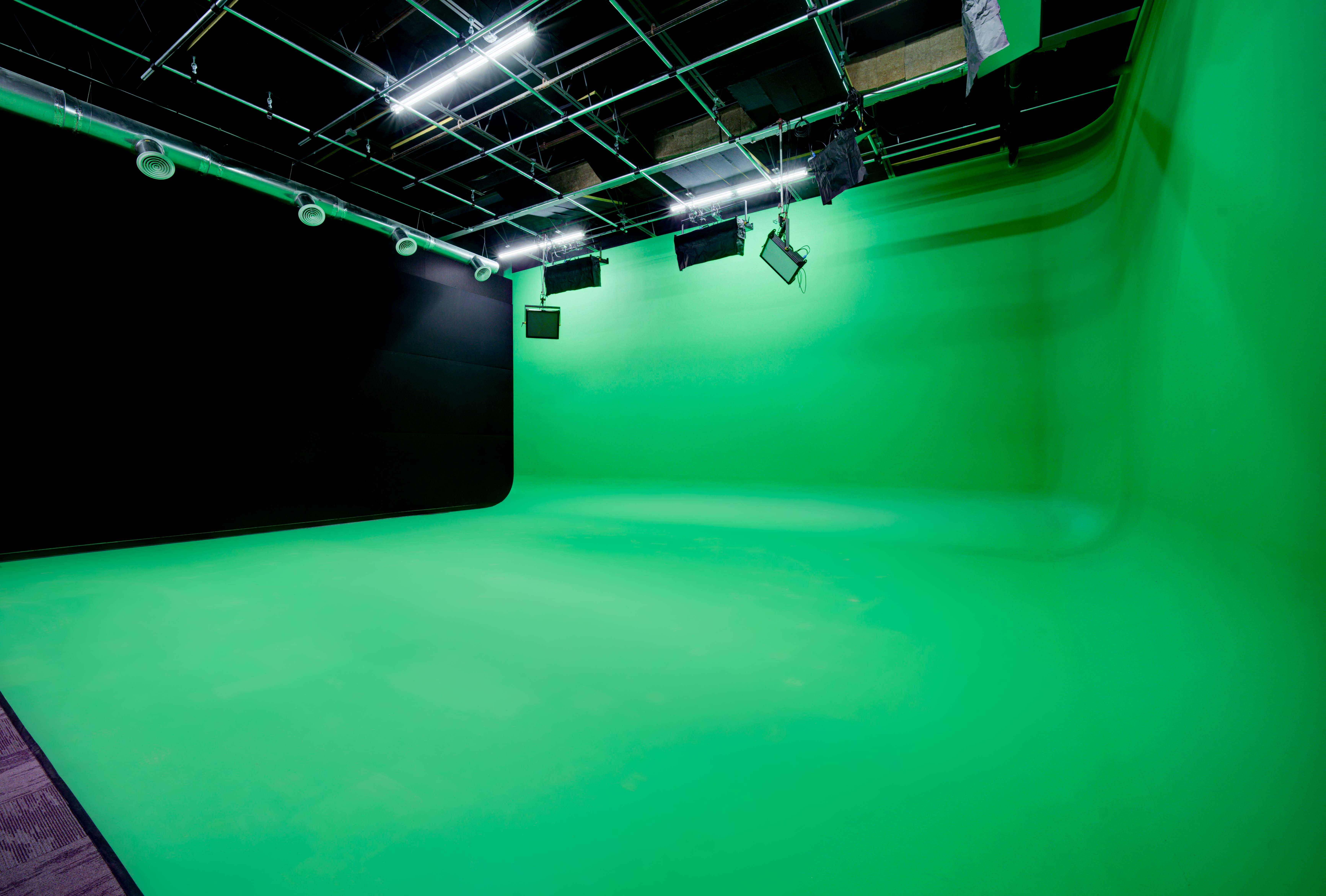 1,200+ sqft Green Screen Cyc Studio with Full Lighting Grid & Drive-In Access
