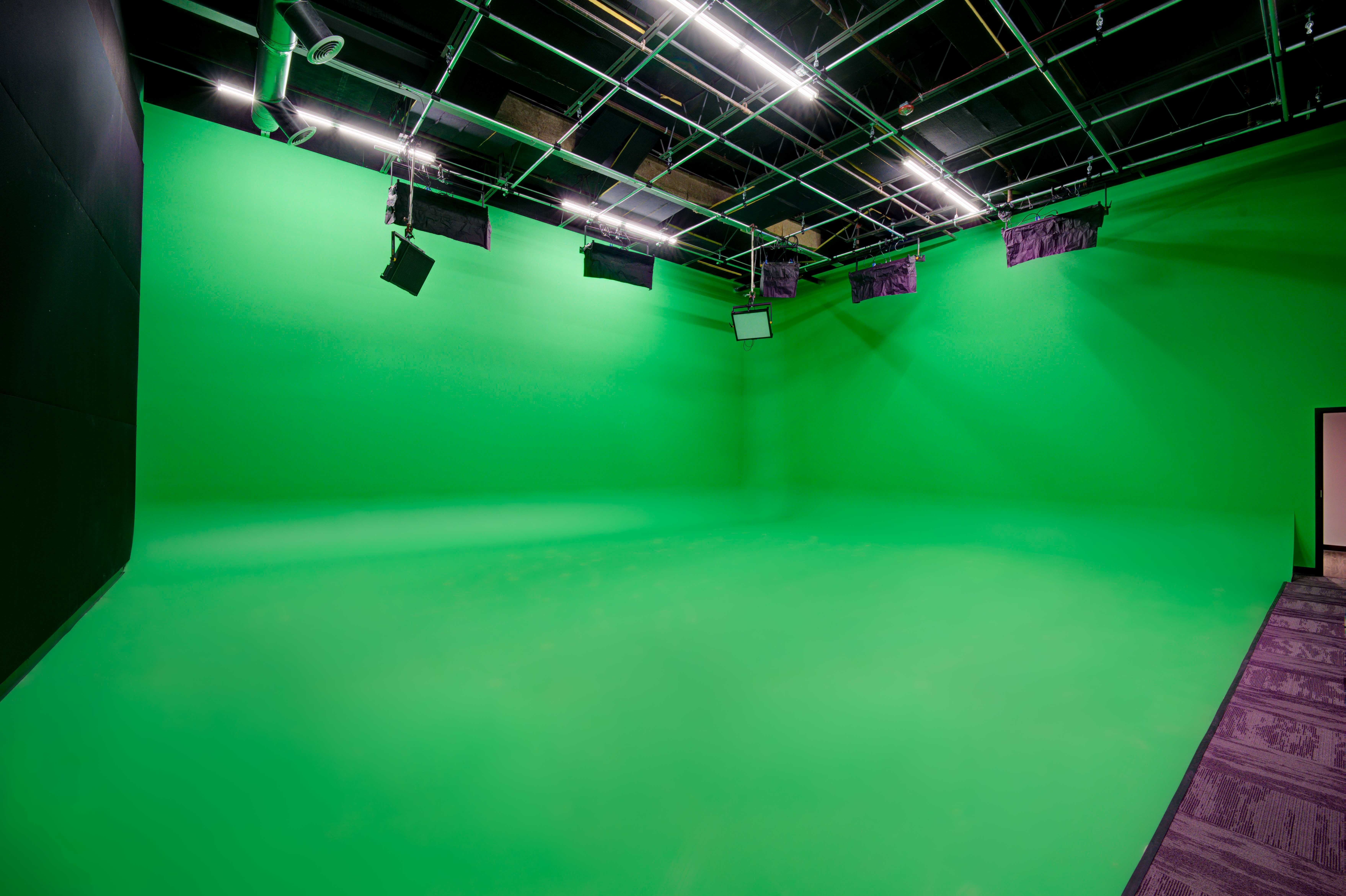 1,200+ sqft Green Screen Cyc Studio with Full Lighting Grid & Drive-In Access