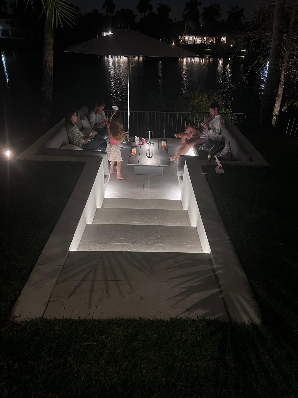 House with a big and nice landscaped backyard with a big lake