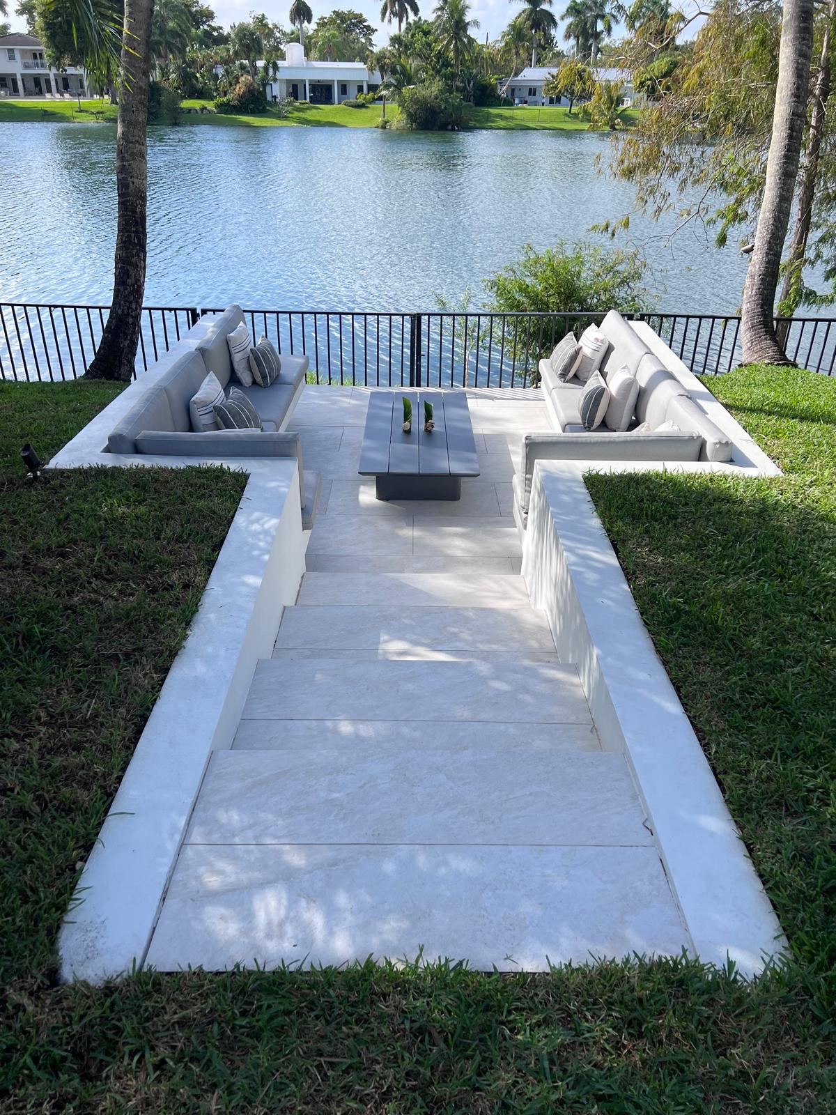 House with a big and nice landscaped backyard with a big lake