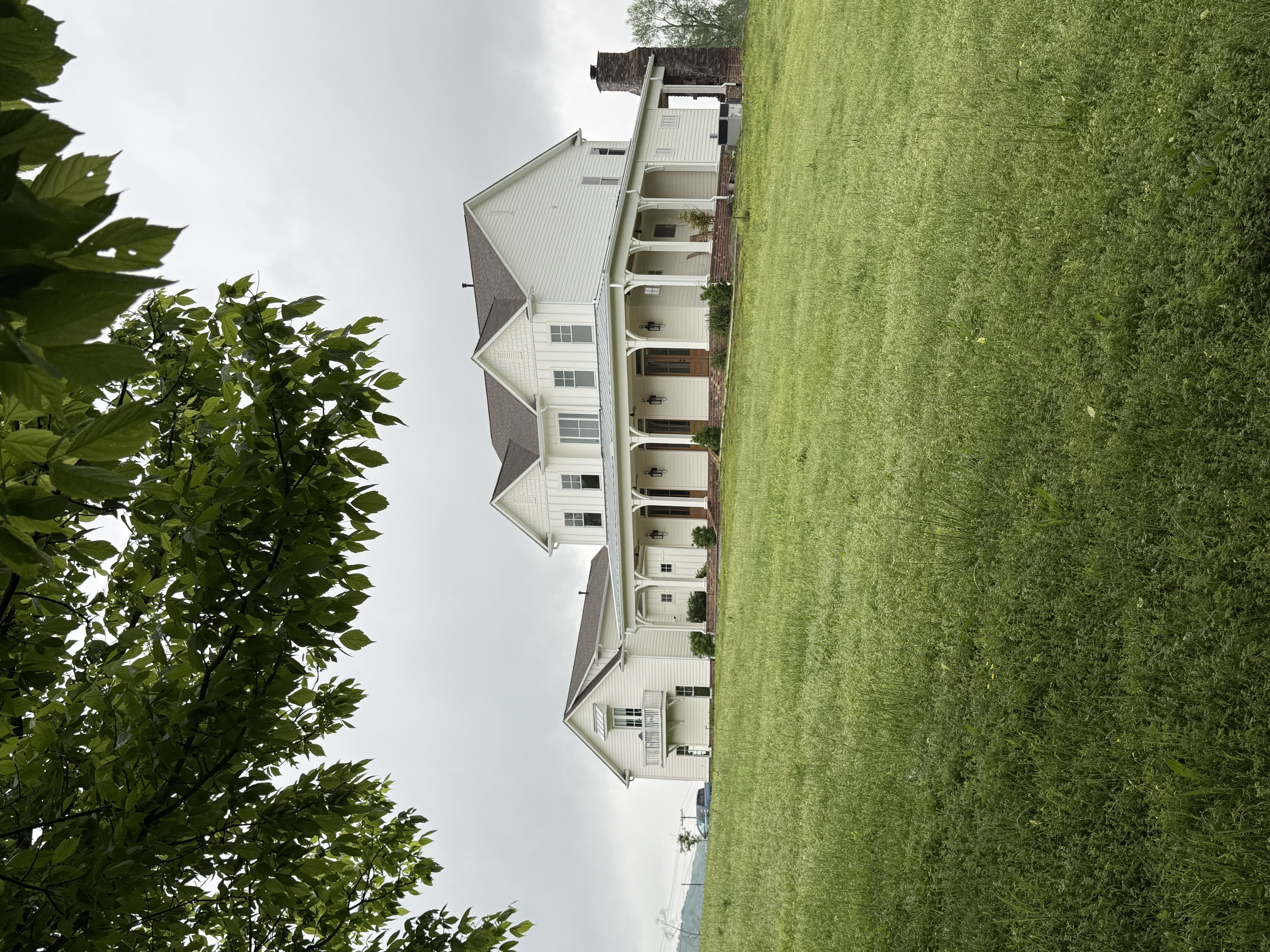 Maplewood Hollow—Modern White Farmhouse, gorgeous white kitchen with oversized island, 12 acres, rolling hills, pond, sunrise and sunset views and bucolic country natural scenery.