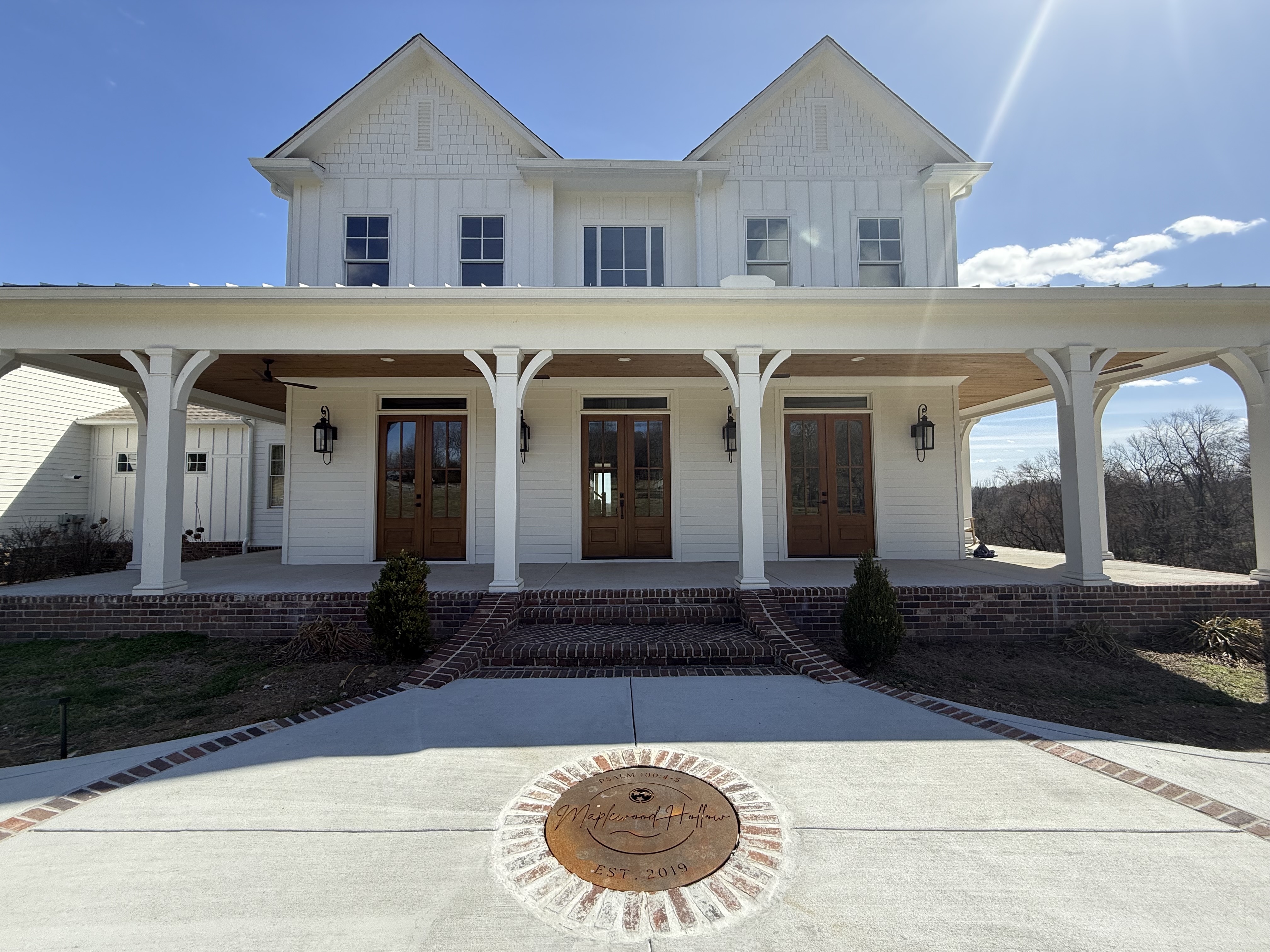 Maplewood Hollow—Modern White Farmhouse, gorgeous white kitchen with oversized island, 12 acres, rolling hills, pond, sunrise and sunset views and bucolic country natural scenery.