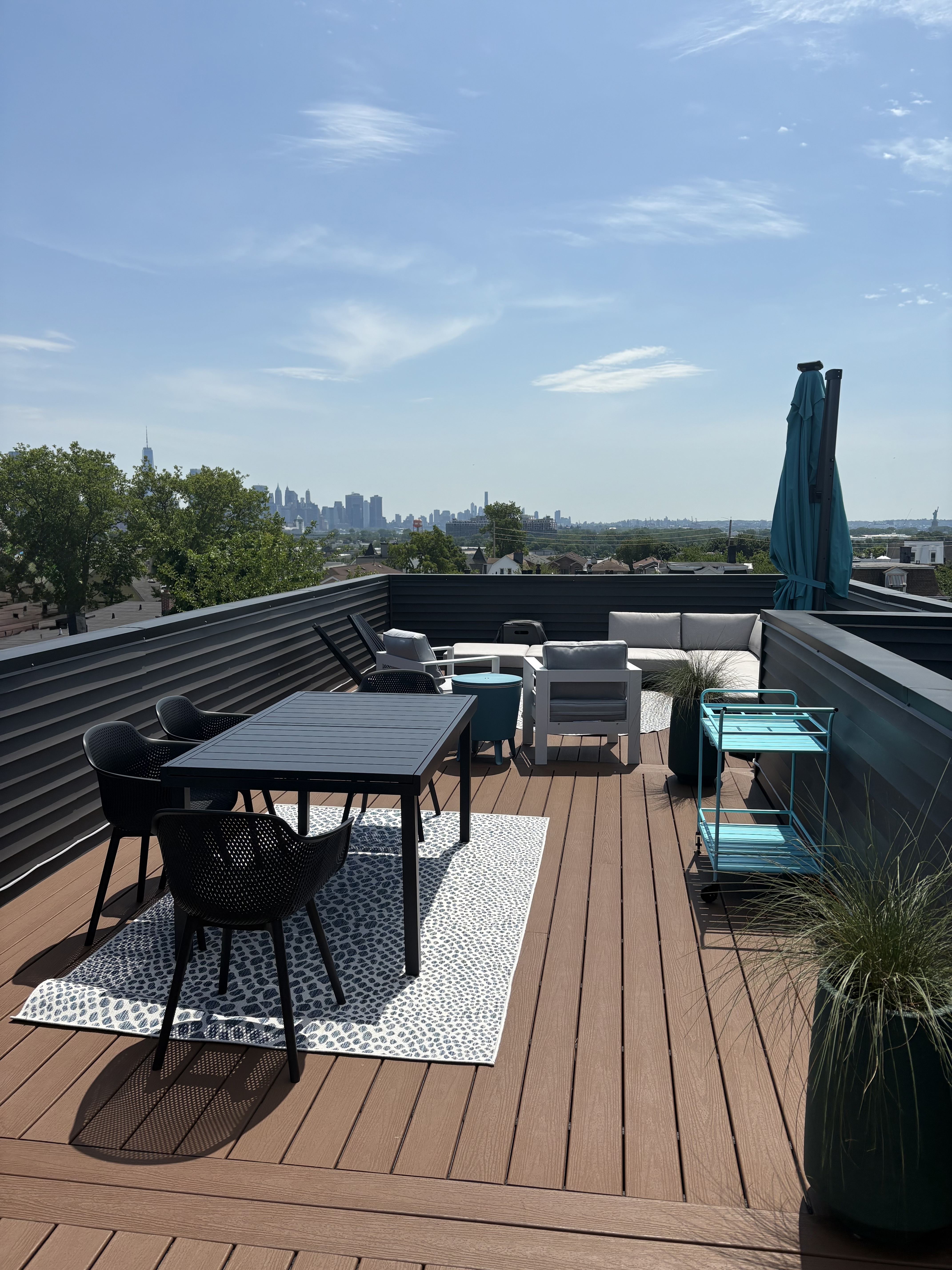 Sunlit Top-Floor Condo with Private Rooftop & NYC Skyline Views