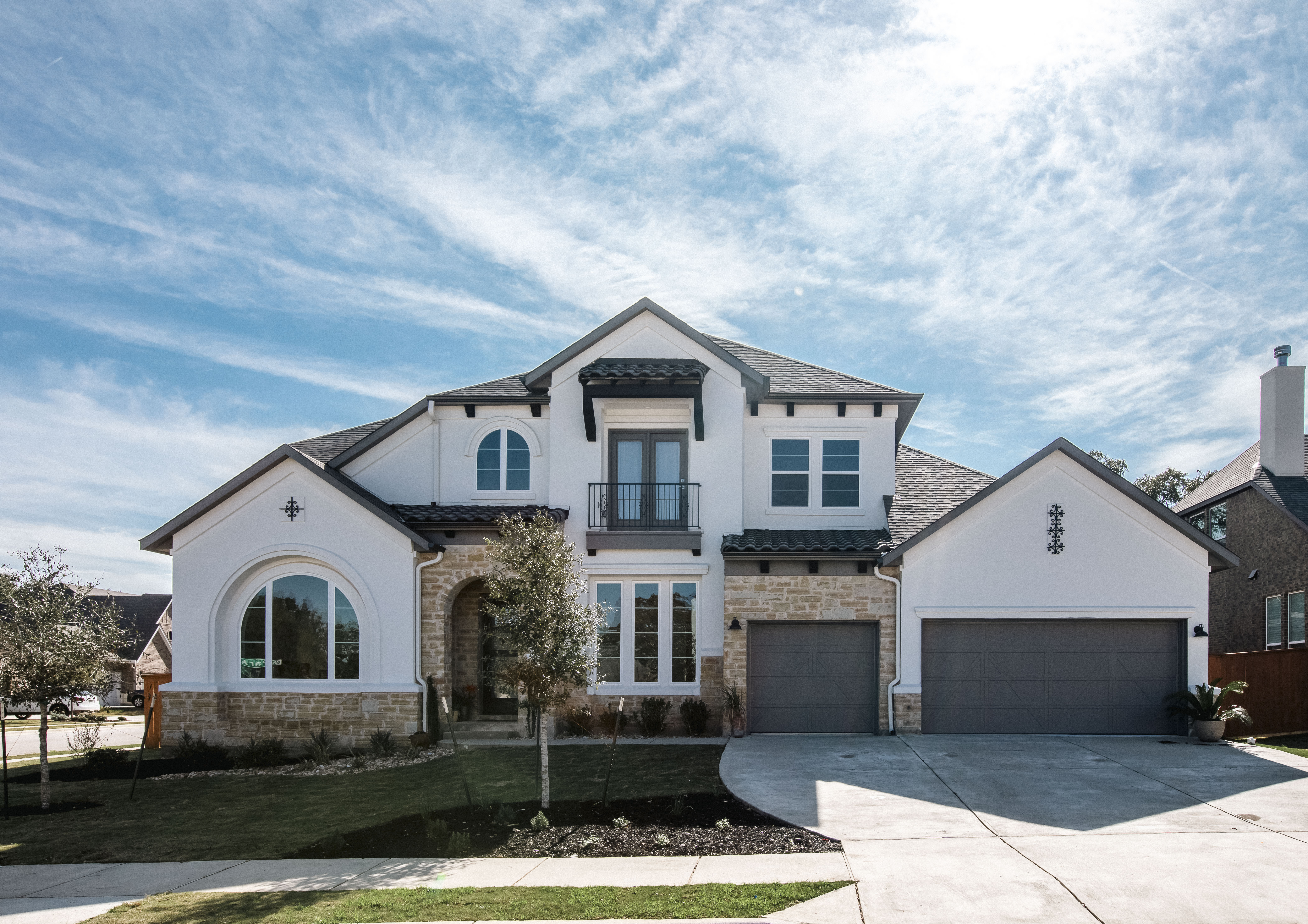 Modern, bright home with white walls and high ceilings. 