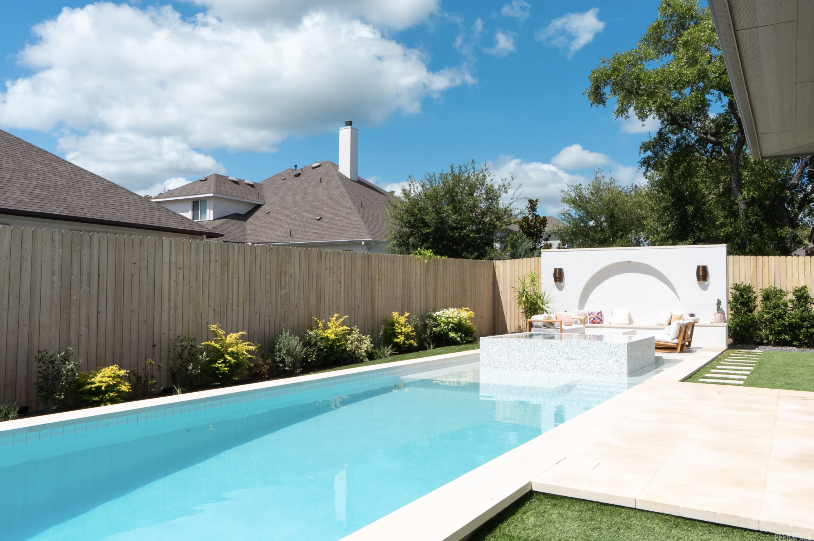 Modern, bright home with white walls and high ceilings. 