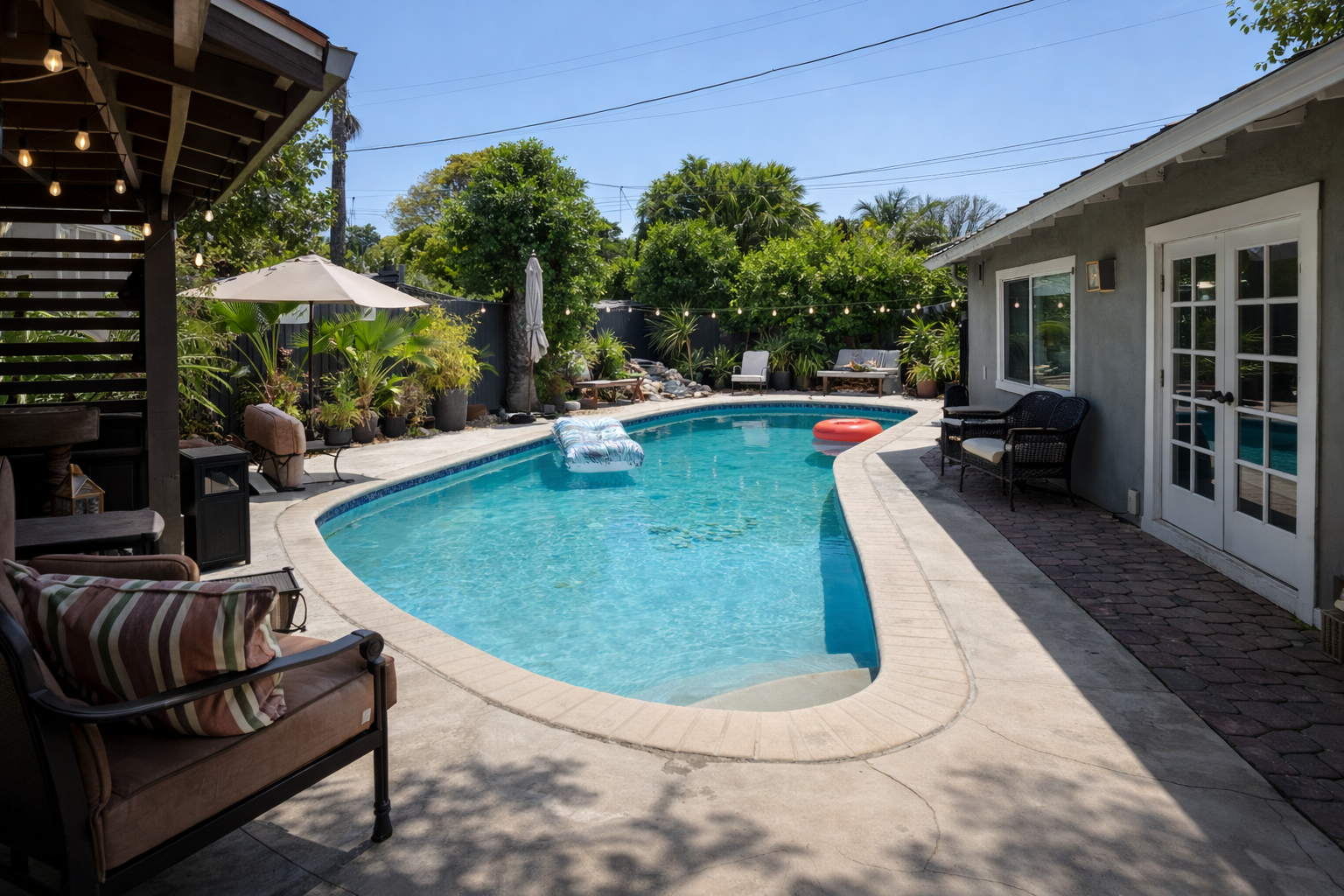 California Cool Pool House with Lush Backyard Oasis